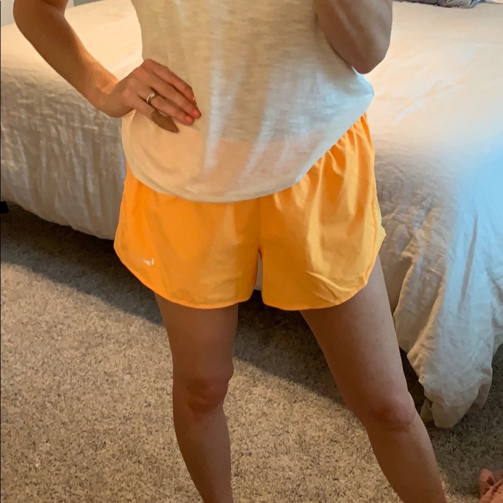 Bright orange nike shorts